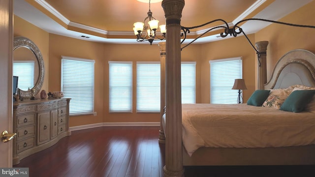 3701 Spicebush Way, Frederick, MD 21704 - bedroom with a tray ceiling, baseboards, ornamental molding, a chandelier, and dark wood-style flooring