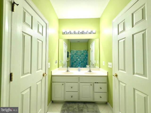 3701 Spicebush Way, Frederick, MD 21704 - bathroom featuring tile patterned floors, double vanity, baseboards, and curtained shower