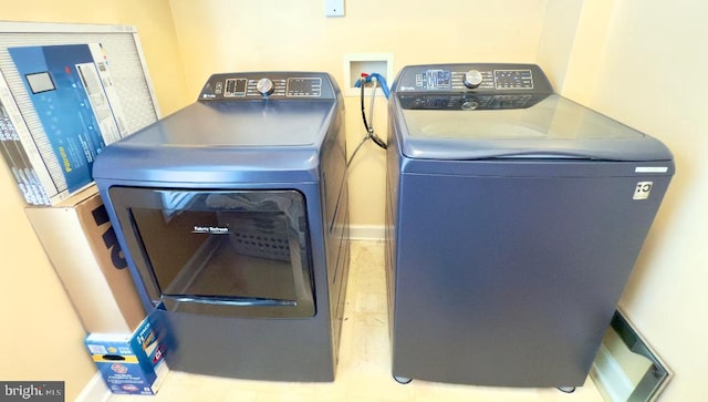 3701 Spicebush Way, Frederick, MD 21704 - laundry room with washing machine and clothes dryer and baseboards