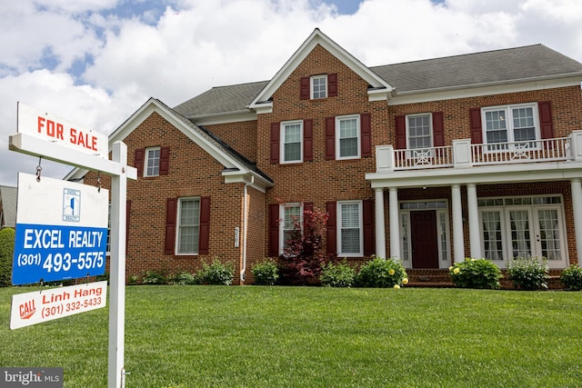 3701 Spicebush Way, Frederick, MD 21704 - view of front of house featuring brick siding, a front lawn, and a shingled roof