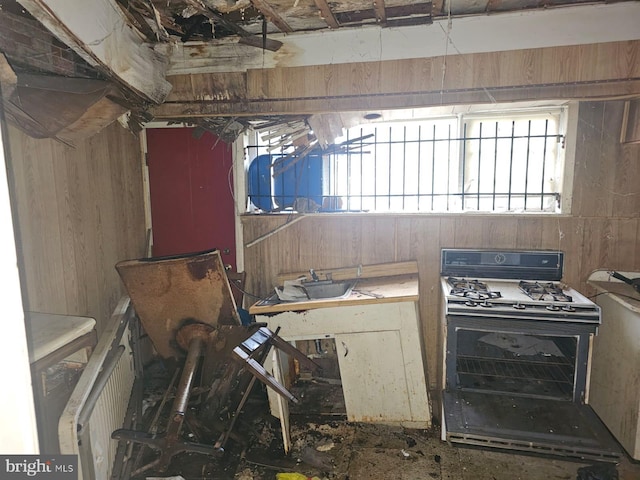 kitchen featuring radiator and gas stove