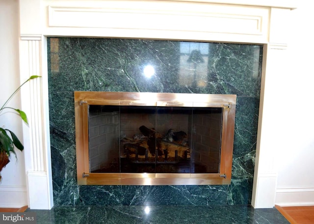 room details featuring a high end fireplace