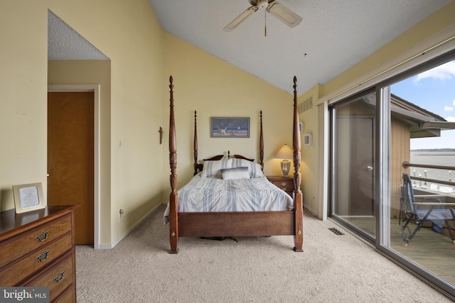 bedroom with lofted ceiling, a ceiling fan, access to outside, and light colored carpet