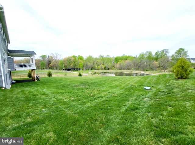 view of yard with a water view