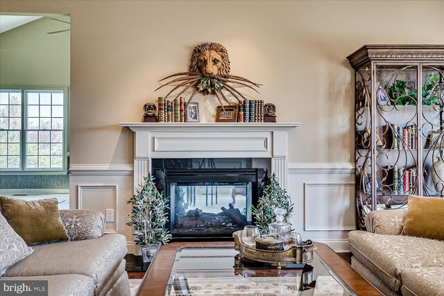 6 Ridgeview Way, Allentown, NJ 08501 - living area featuring a wainscoted wall, wood finished floors, and a fireplace