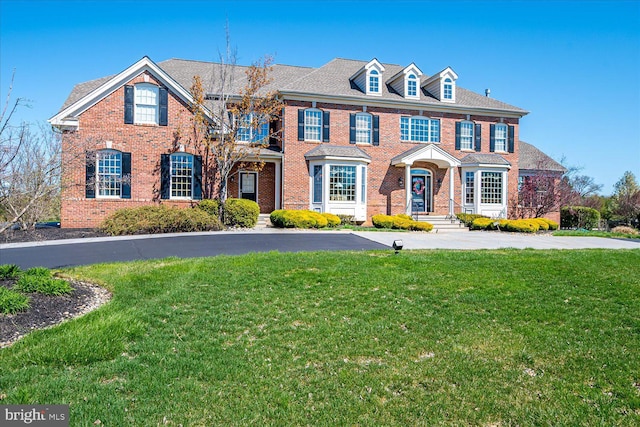 6 Ridgeview Way, Allentown, NJ 08501 - colonial inspired home with a front lawn and brick siding