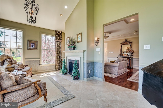 6 Ridgeview Way, Allentown, NJ 08501 - living area featuring wainscoting, recessed lighting, ornamental molding, and a fireplace with flush hearth