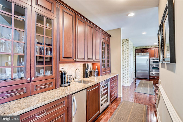 6 Ridgeview Way, Allentown, NJ 08501 - kitchen featuring wine cooler, a sink, baseboards, dark wood-type flooring, and appliances with stainless steel finishes