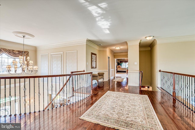 6 Ridgeview Way, Allentown, NJ 08501 - corridor with crown molding, a chandelier, dark wood-type flooring, and plenty of natural light