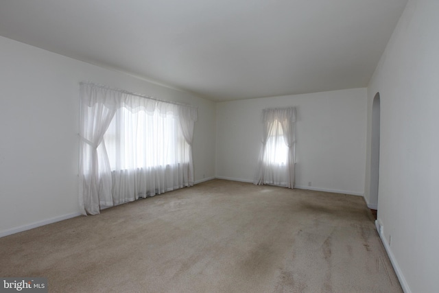 30 Cooper Ave, Marlton, NJ 08053 - carpeted spare room with a wealth of natural light, baseboards, and arched walkways