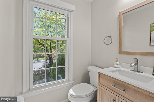 half bath with toilet and vanity