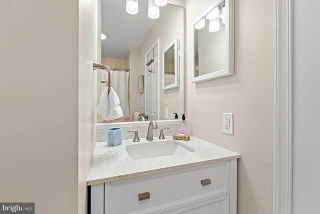full bath featuring vanity