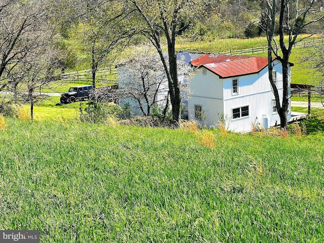 250 Lower Pine Grove Rd, Baker, WV 26801 - view of property exterior featuring an outdoor structure, an outbuilding, and metal roof