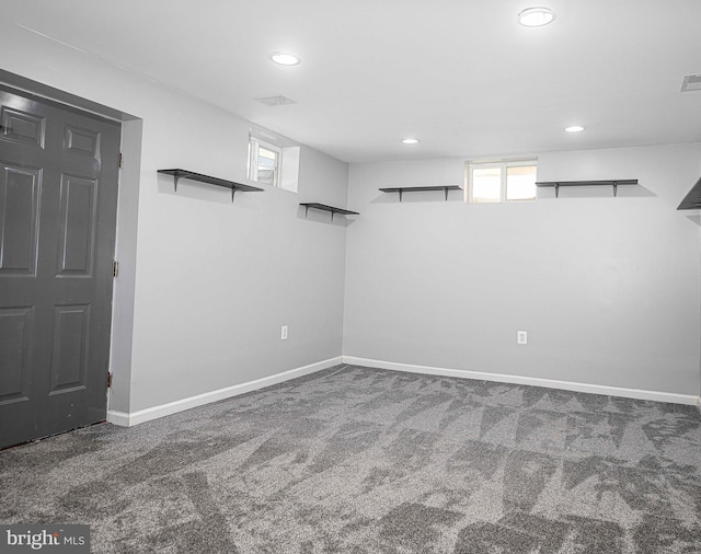 below grade area featuring recessed lighting, carpet, and baseboards