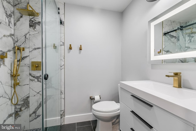 bathroom with toilet, vanity, and a marble finish shower