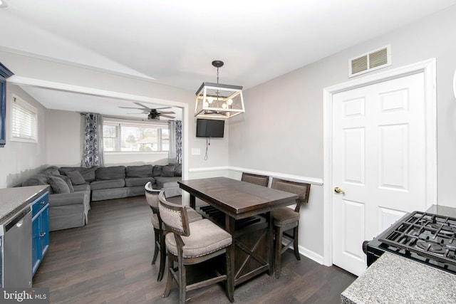 dining area featuring baseboards, visible vents, dark wood-type flooring, and ceiling fan