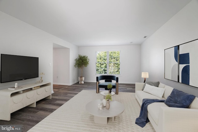 13217 Gundale, Middle River, MD 21220 - living area featuring baseboards and dark wood-type flooring
