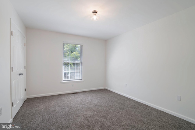 13217 Gundale, Middle River, MD 21220 - carpeted spare room with baseboards and visible vents