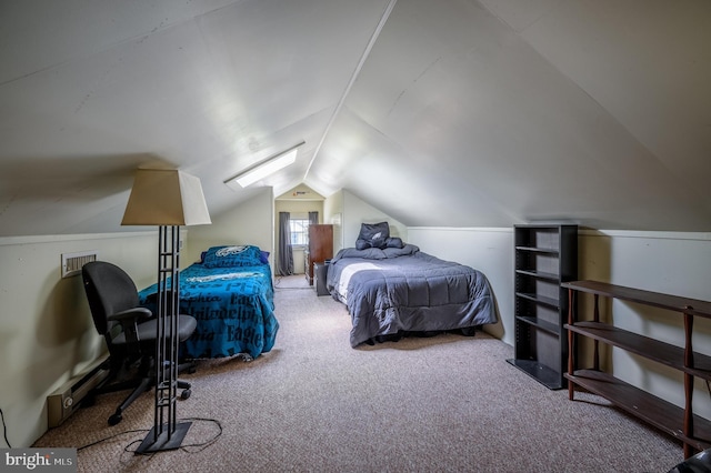 bedroom featuring visible vents, carpet flooring, and vaulted ceiling