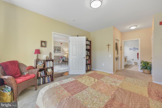 20600 Hope Spring Ter Unit 202, Ashburn, VA 20147 - carpeted bedroom with baseboards and connected bathroom