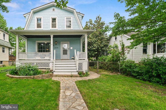 3330 Richmond Ave, Baltimore, MD 21213 - colonial inspired home featuring a gambrel roof and a porch