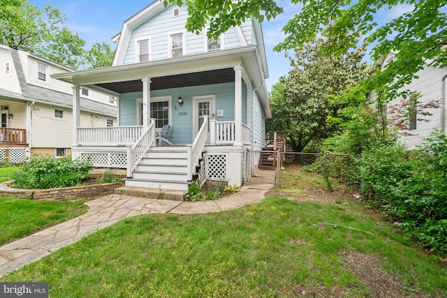 3330 Richmond Ave, Baltimore, MD 21213 - view of front of property with covered porch, a gambrel roof, and stairs