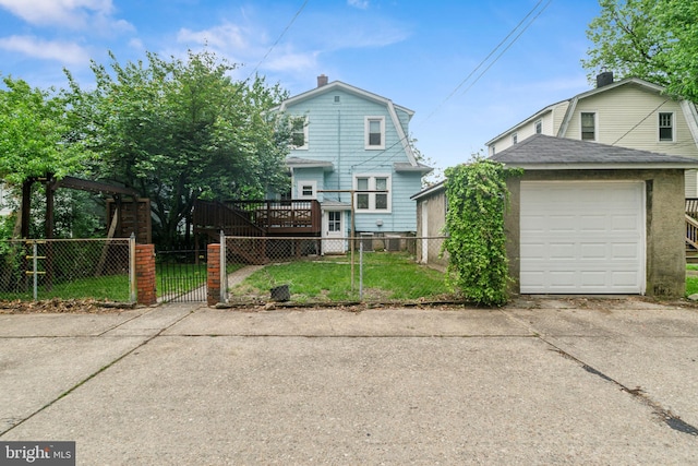 3330 Richmond Ave, Baltimore, MD 21213 - view of front of home featuring a gambrel roof, concrete driveway, a gate, and a chimney