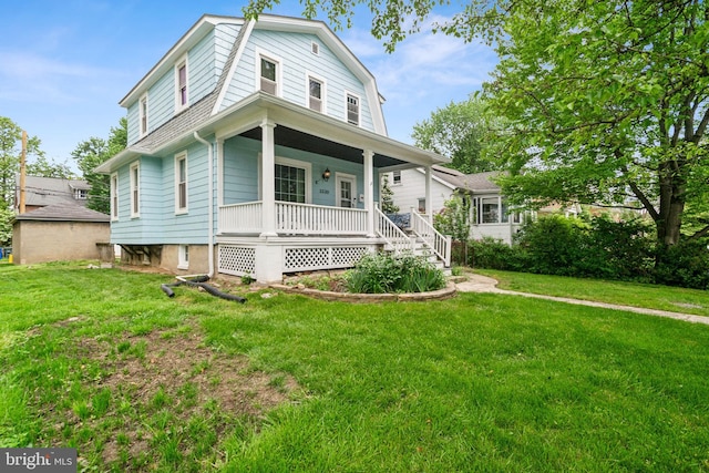 3330 Richmond Ave, Baltimore, MD 21213 - colonial inspired home featuring a porch, a front lawn, a gambrel roof, and a shingled roof