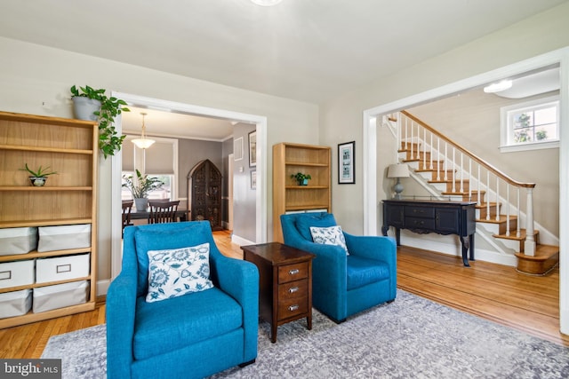 3330 Richmond Ave, Baltimore, MD 21213 - living area with wood finished floors, stairs, and plenty of natural light