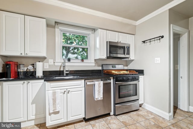 3330 Richmond Ave, Baltimore, MD 21213 - kitchen featuring stainless steel appliances, a sink, white cabinets, baseboards, and ornamental molding