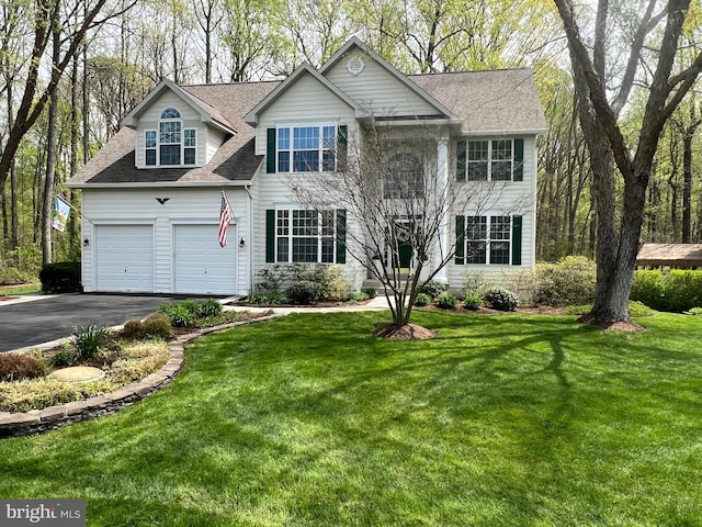 3211 Havenwood Ct, Edgewater, MD 21037 - view of front of house featuring driveway, roof with shingles, a front lawn, and an attached garage