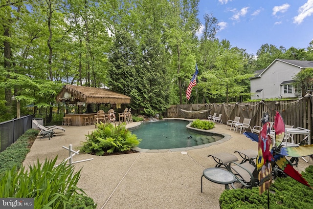 3211 Havenwood Ct, Edgewater, MD 21037 - view of pool with a fenced backyard, a patio, and view of wooded area