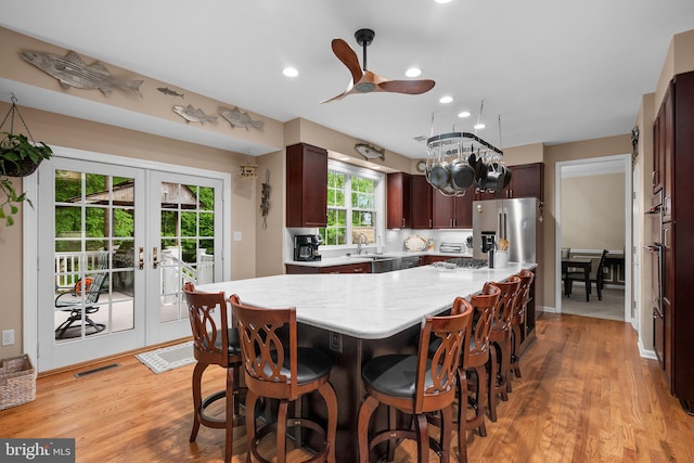 3211 Havenwood Ct, Edgewater, MD 21037 - dining space with ceiling fan, french doors, light wood-style flooring, and recessed lighting