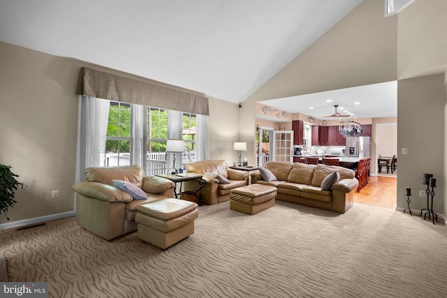 3211 Havenwood Ct, Edgewater, MD 21037 - living room featuring high vaulted ceiling, light carpet, a chandelier, baseboards, and recessed lighting