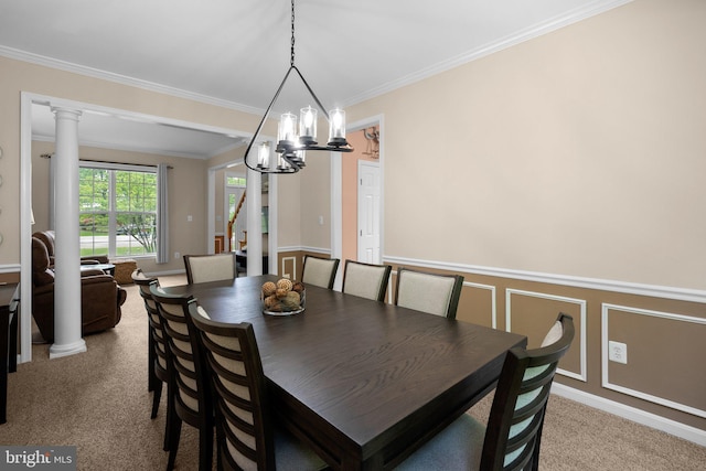 3211 Havenwood Ct, Edgewater, MD 21037 - dining space with carpet, a chandelier, ornamental molding, ornate columns, and a wainscoted wall