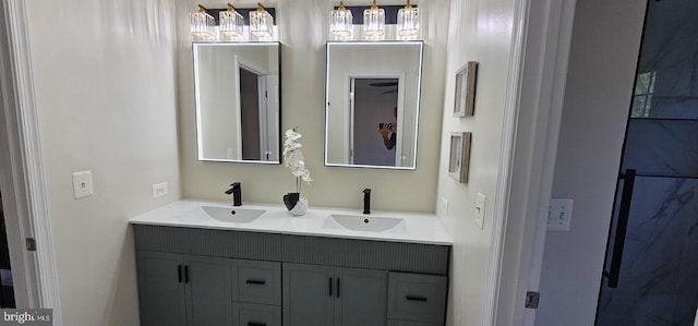 full bathroom featuring double vanity and a sink
