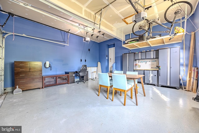 dining space featuring speckled floor