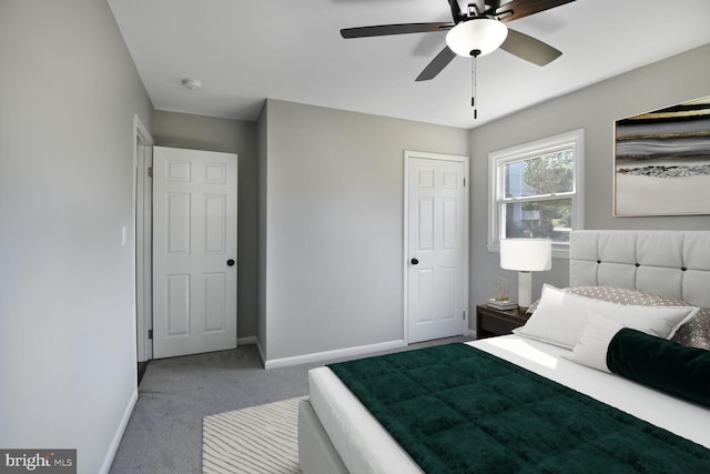 bedroom featuring baseboards, carpet, and a ceiling fan