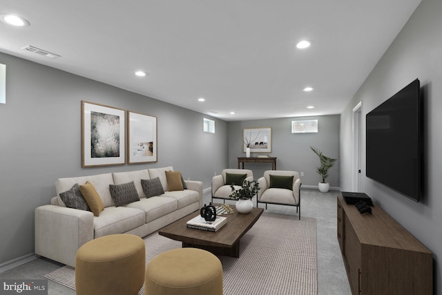 living room featuring recessed lighting, baseboards, visible vents, and carpet