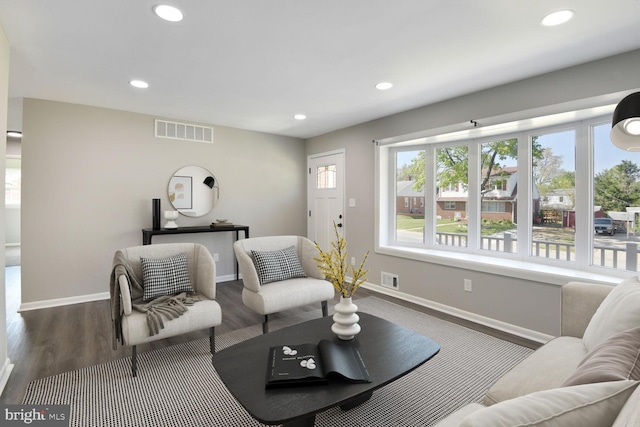 living area featuring plenty of natural light, recessed lighting, and visible vents