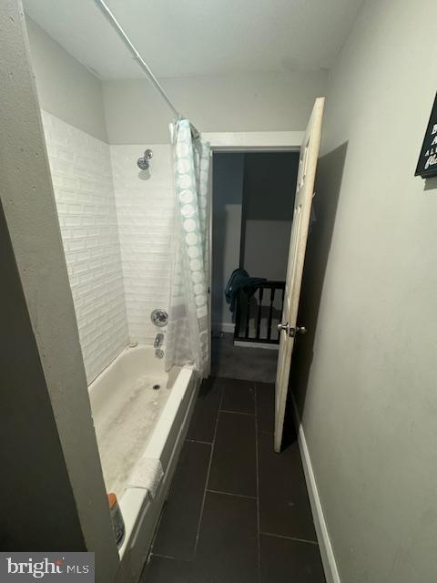 1341 E Rittenhouse St, Philadelphia, PA 19138 - bathroom featuring baseboards, shower / tub combo with curtain, and tile patterned floors