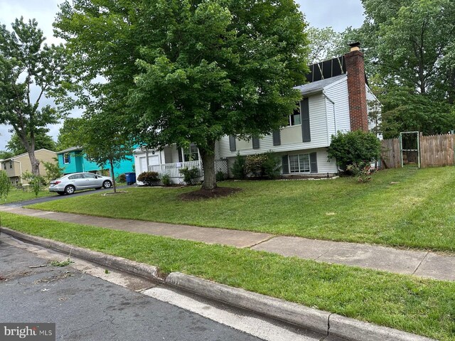 1207 Sunrise Ct, Herndon, VA 20170 - view of front facade featuring a chimney