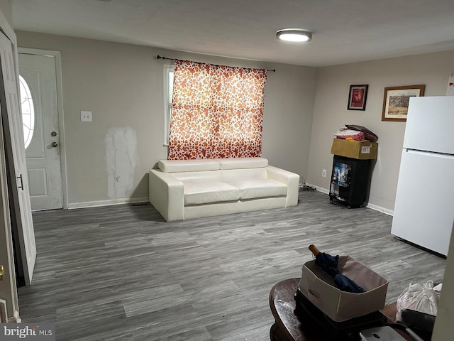 1207 Sunrise Ct, Herndon, VA 20170 - living room with baseboards and wood finished floors