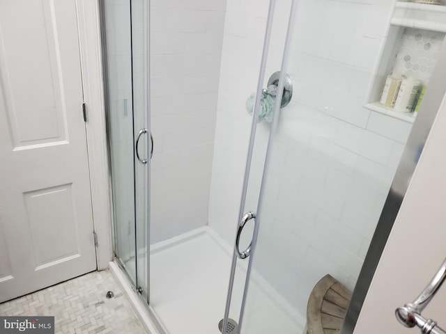 bathroom with a stall shower