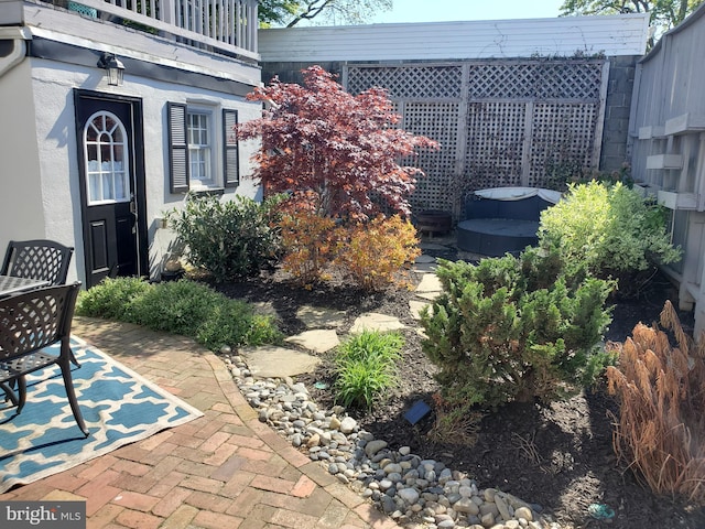 exterior space with a balcony and a patio area