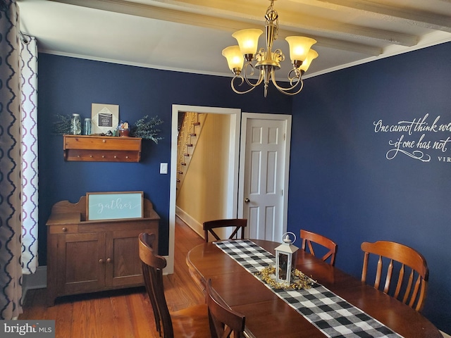 dining space featuring wood finished floors, an inviting chandelier, stairs, beamed ceiling, and ornamental molding