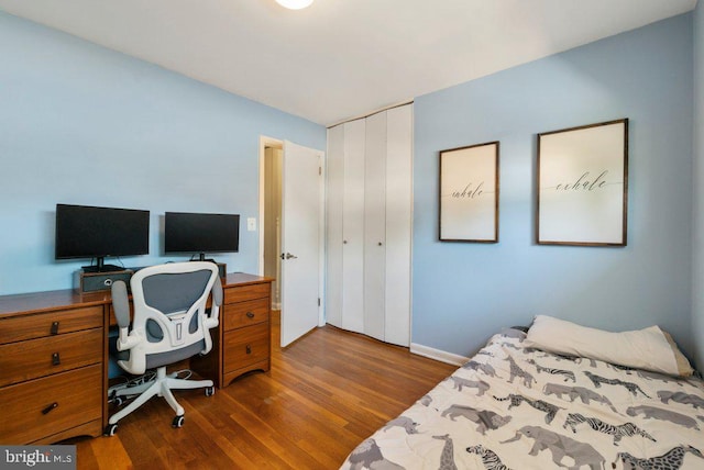 25 Haddington Rd, Lutherville Timonium, MD 21093 - bedroom featuring a closet, baseboards, and dark wood-type flooring