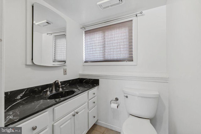 25 Haddington Rd, Lutherville Timonium, MD 21093 - bathroom with toilet, tile patterned floors, visible vents, and vanity