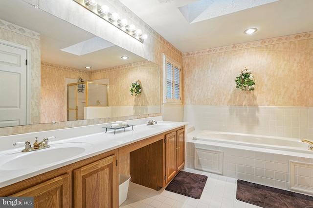 1728 Catherine Fran Dr, Accokeek, MD 20607 - full bathroom with tile patterned flooring, a stall shower, a skylight, and a sink