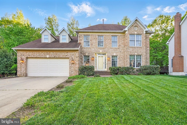 1728 Catherine Fran Dr, Accokeek, MD 20607 - colonial inspired home with a front yard, a garage, brick siding, driveway, and roof with shingles